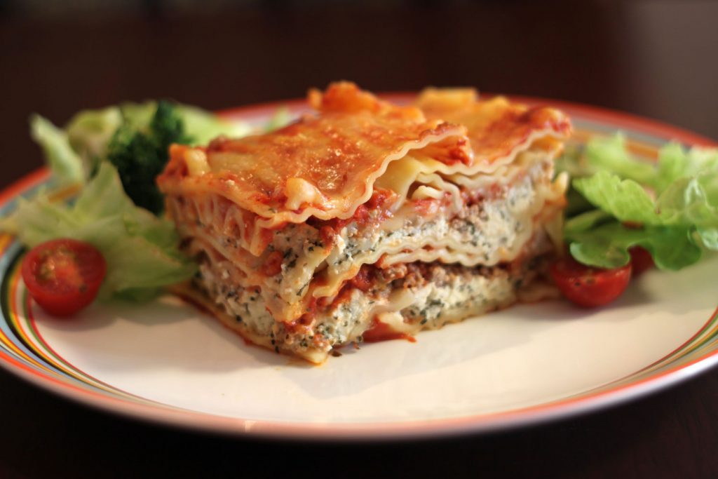 Catering - Lasagna with salad on a plate - Thornbridge Outdoors