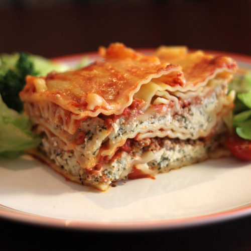 Catering - Lasagna with salad on a plate