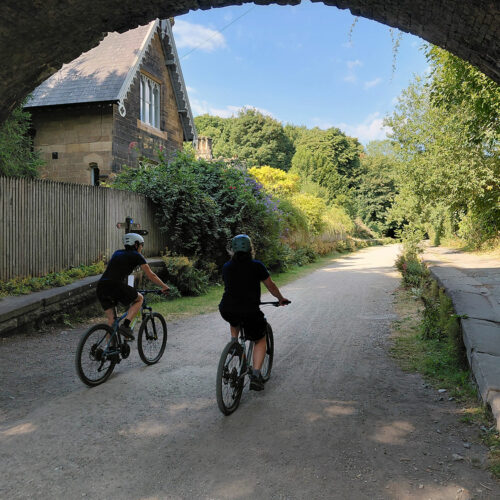 Bike Hire 2 people riding bikes on the Monsal Trail