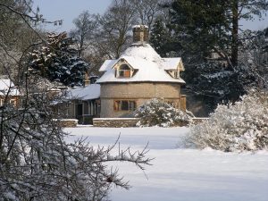 The Farm House in winter covered in snow