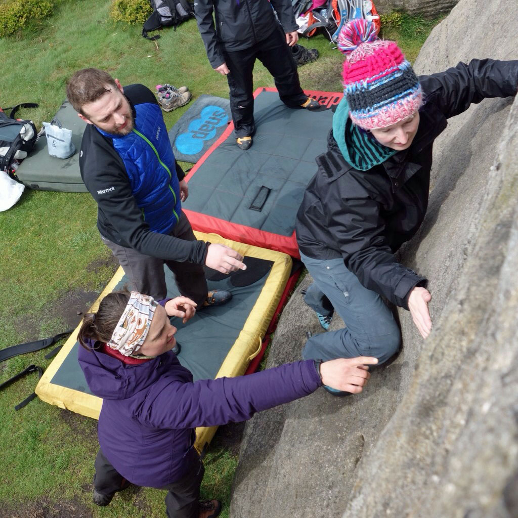 Adults on a bouldering skills course