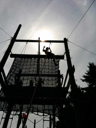 Pupils on the ladder and net climb (high ropes) at Thornbridge Outdoors