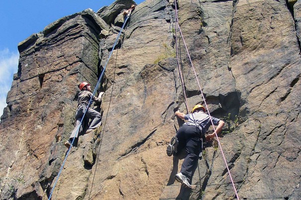 Pupils rock climbing in the Peak District