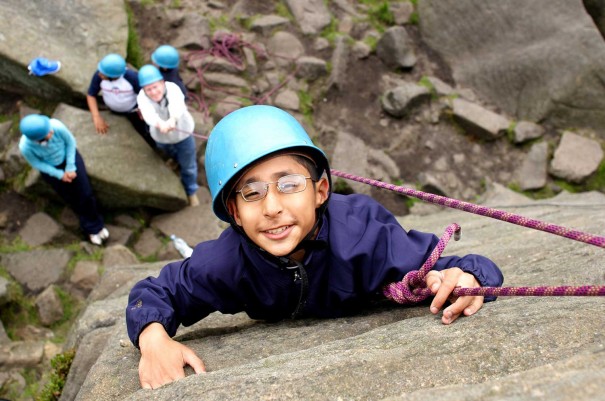 Pupil rock climbing in the Peak District