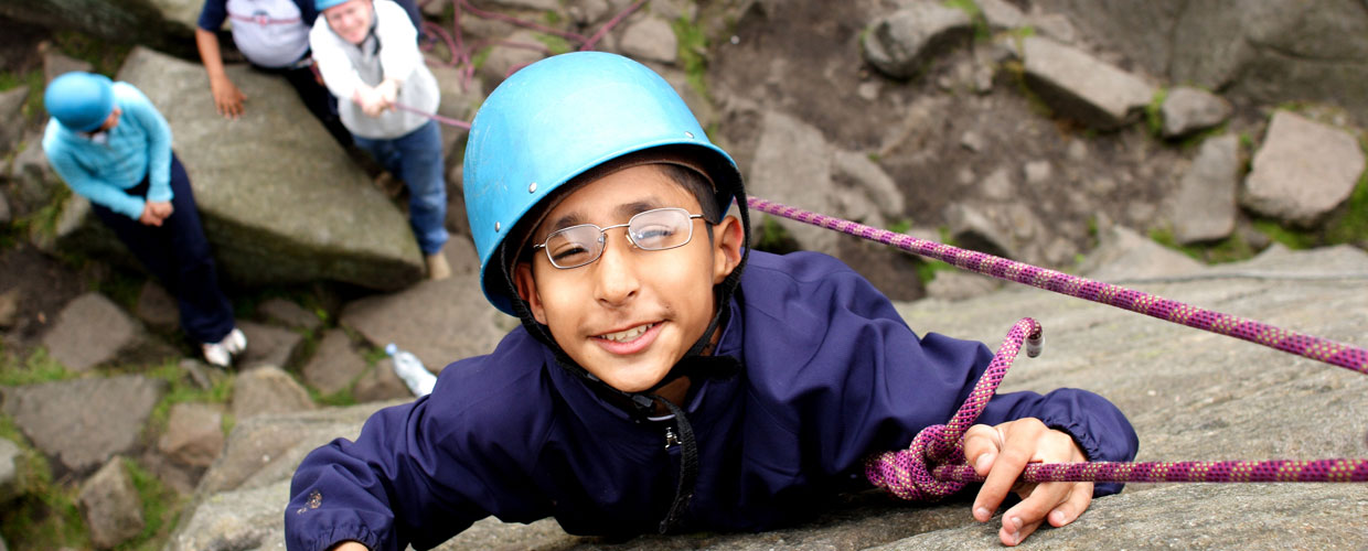 Pupil rock climbing