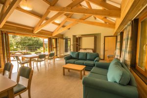 Thornbridge Outdoors, Woodlands, Lounge and Dining Room with Bed