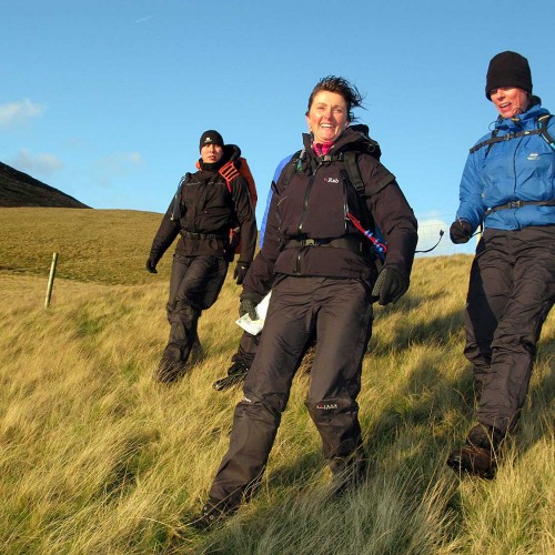 Adults walking in the Peak District