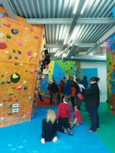 Primary children bouldering at the Climbing Works